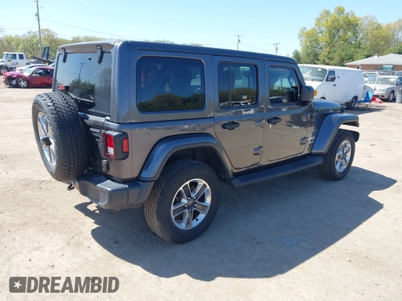 2018 Jeep Wrangler Unlimited Sahara with VIN 1C4HJXEG0JW166645, listed as a IAAI auction lot 42228492 with 58,416 mi miles and . Bid and sale history available at DreamBid. Image 4.