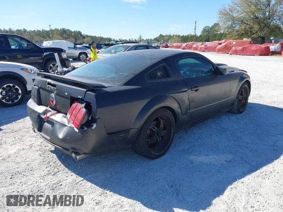 2005 Ford Mustang Deluxe with VIN 1ZVFT80N655136118, listed as a IAAI auction lot 41811969 with 104,071 mi miles. Bid and sale history available at carsss.com. Image 4.