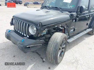 2022 Jeep Wrangler Unlimited Sahara with VIN 1C4JJXP69NW269462, listed as a IAAI auction lot 41759162 with 19,629 mi miles and . Bid and sale history available at DreamBid. Image 6.