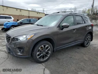 2016 Mazda CX-5 Grand Touring with VIN JM3KE4DY5G0848717, listed as a Copart auction lot 53249895 with 86,746 mi miles and Salvage Title. Bid and sale history available at carsss.com. Image 1.