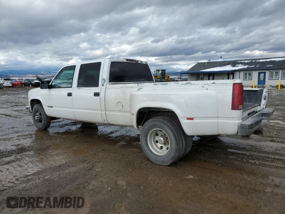 1999 Chevrolet Silverado 3500 z VIN 1GCHC33J2XF087634, wystawiony jako Copart lot #58106714 z przebiegiem 205 431 mil mil oraz Czysty tytuł • Clean title. Historia ofert i sprzedaży dostępna na DreamBid. Obrazek 2.