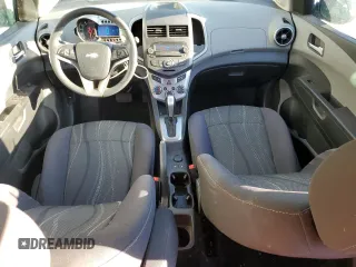 2014 Chevrolet Sonic LT with VIN 1G1JC5SH7E4220059, listed as a Copart auction lot 49877765 with 136,896 mi miles and Salvage Title. Bid and sale history available at DreamBid. Image 8.