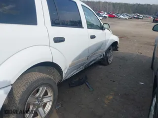 2004 Dodge Durango SLT with VIN 1D4HD48N44F217233, listed as a IAAI auction lot 41792773 with 105,741 mi miles. Bid and sale history available at carsss.com. Image 6.