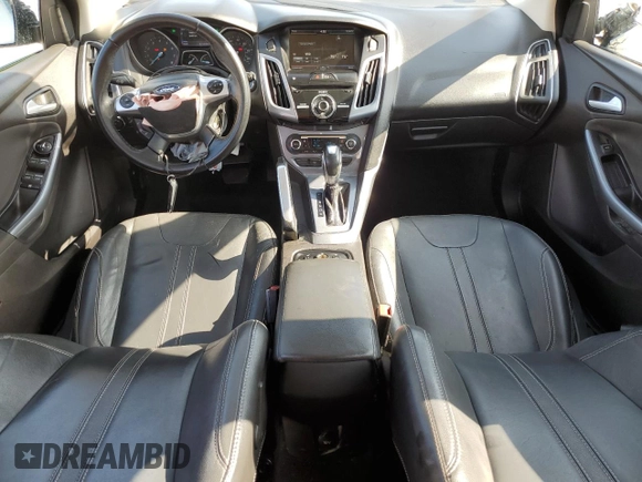 2014 Ford Focus Titanium z VIN 1FADP3N27EL161613, wystawiony jako Copart lot #56166805 z przebiegiem 140 336 mil mil oraz Szkoda całkowita • Salvage title. Historia ofert i sprzedaży dostępna na DreamBid. Obrazek 8.