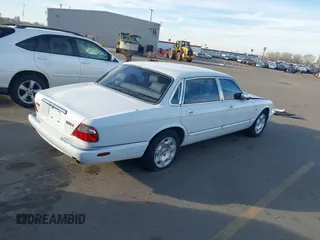 1998 Jaguar XJ Vanden Plas with VIN SAJKX6241WC829353, listed as a IAAI auction lot 41872667 with Not Provided miles and . Bid and sale history available at DreamBid. Image 4.