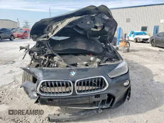 2018 BMW X2 sDrive28i z VIN WBXYJ3C32JEJ75705, wystawiony jako Copart lot #50643885 z przebiegiem 112 772 mil mil oraz Szkoda całkowita • Salvage title. Historia ofert i sprzedaży dostępna na DreamBid. Obrazek 5.