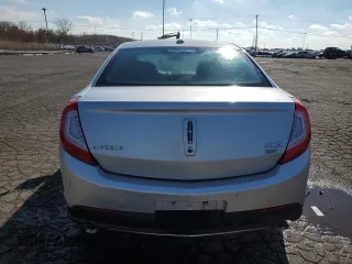 2014 Lincoln MKS with VIN 1LNHL9EK5EG606901, listed as a Copart auction lot 75300803 with 98,694 mi miles and Clean Title. Bid and sale history available at DreamBid. Image 6.