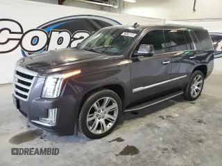 2015 Cadillac Escalade Luxury z VIN 1GYS4MKJ9FR527592, wystawiony jako Copart lot #47478805 z przebiegiem 131 038 mil mil oraz Tytuł czysty. Historia ofert i sprzedaży dostępna na DreamBid. Obrazek 1.