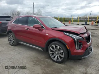 2020 Cadillac XT4 AWD Premium Luxury with VIN 1GYFZDR46LF016390, listed as a Copart auction lot 54047565 with 32,449 mi miles and Salvage title. Bid and sale history available at DreamBid. Image 4.