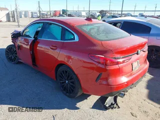 2021 BMW 2 Series 228i with VIN WBA53AK0XM7J01878, listed as a IAAI auction lot 41251154 with 61,199 mi miles. Bid and sale history available at carsss.com. Image 3.