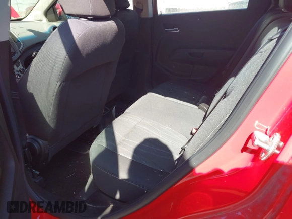 2014 Chevrolet Sonic LT with VIN 1G1JC6SG1E4129835, listed as a IAAI auction lot 42080133 with 94,170 mi miles. Bid and sale history available at carsss.com. Image 8.