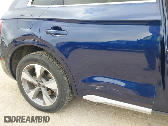 2023 Audi Q5 Premium Plus z VIN WA1BBAFY2P2078231, wystawiony jako IAAI lot #41601204 z przebiegiem 35 007 mil mil oraz . Historia ofert i sprzedaży dostępna na DreamBid. Obrazek 19.