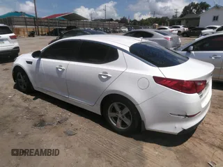 2015 Kia Optima LX with VIN KNAGM4A70F5645049, listed as a IAAI auction lot 42758383 with 214,934 mi miles and . Bid and sale history available at DreamBid. Image 3.