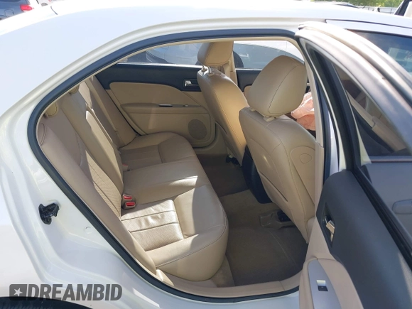 2010 Mercury Milan Premier with VIN 3MEHM0JA2AR633601, listed as a IAAI auction lot 42028637 with 114,122 mi miles and . Bid and sale history available at DreamBid. Image 8.