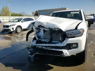 2023 Toyota Tacoma SR z VIN 3TMCZ5AN5PM647530, wystawiony jako Copart lot #54549125 z przebiegiem 8 992 mil mil oraz Szkoda całkowita • Salvage title. Historia ofert i sprzedaży dostępna na DreamBid. Obrazek 14.
