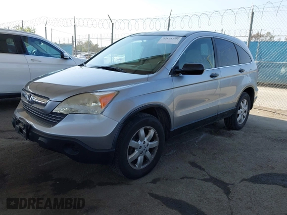 2007 Honda CR-V EX with VIN JHLRE38557C069515, listed as a IAAI auction lot 42121504 with 153,971 mi miles and . Bid and sale history available at carsss.com. Image 2.