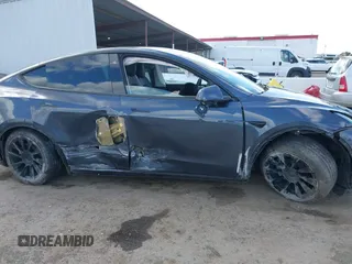 2022 Tesla Model Y Long Range with VIN 7SAYGAEE6NF341827, listed as a IAAI auction lot 41946388 with Not Provided miles and . Bid and sale history available at DreamBid. Image 6.