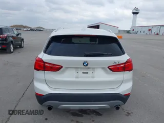 2016 BMW X1 xDrive28i with VIN WBXHT3C35GP886144, listed as a IAAI auction lot 41954742 with 89,268 mi miles. Bid and sale history available at carsss.com. Image 22.