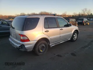 2002 Mercedes-Benz M-Class with VIN 4JGAB54E32A312131, listed as a Copart auction lot 80490084 with 165,365 mi miles and Salvage Title. Bid and sale history available at carsss.com. Image 3.