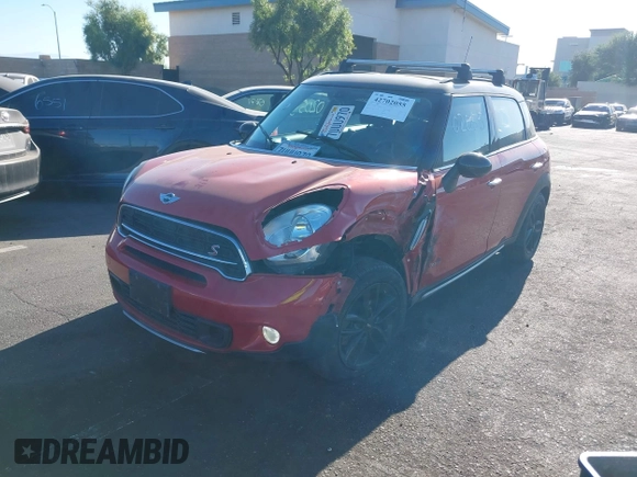 2016 MINI Countryman S with VIN WMWZC5C50GWU02754, listed as a IAAI auction lot 42702055 with 105,284 mi miles and . Bid and sale history available at DreamBid. Image 2.