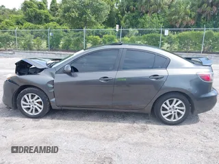 2012 Mazda 3 i Touring z VIN JM1BL1V75C1555049, wystawiony jako IAAI lot #42541766 z przebiegiem 236 988 mil mil oraz . Historia ofert i sprzedaży dostępna na DreamBid. Obrazek 14.
