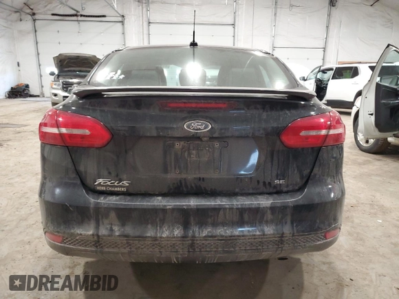 2015 Ford Focus SE z VIN 1FADP3F21FL285263, wystawiony jako Copart lot #53613875 z przebiegiem 116 063 mil mil oraz Szkoda całkowita • Salvage title. Historia ofert i sprzedaży dostępna na DreamBid. Obrazek 6.