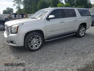 2016 GMC Yukon XL SLT z VIN 1GKS2GKC0GR232465, wystawiony jako Copart lot #57581075 z przebiegiem 131 297 mil mil oraz Szkoda całkowita • Salvage title. Historia ofert i sprzedaży dostępna na DreamBid. Obrazek 1.