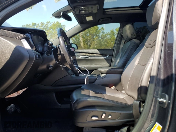 2022 Cadillac XT6 Premium Luxury with VIN 1GYKPCRS1NZ104567, listed as a Copart auction lot 47173005 with 54,541 mi miles and Clean Title. Bid and sale history available at carsss.com. Image 7.