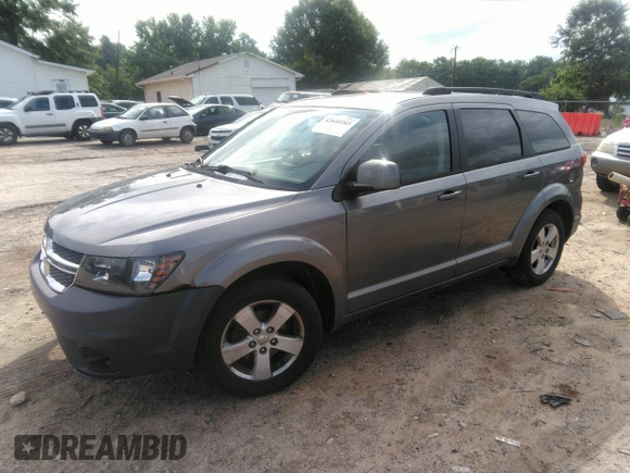 2012 Dodge Journey SXT with VIN 3C4PDCBG9CT153241, listed as a IAAI auction lot 42640265 with 184,719 mi miles and . Bid and sale history available at DreamBid. Image 2.