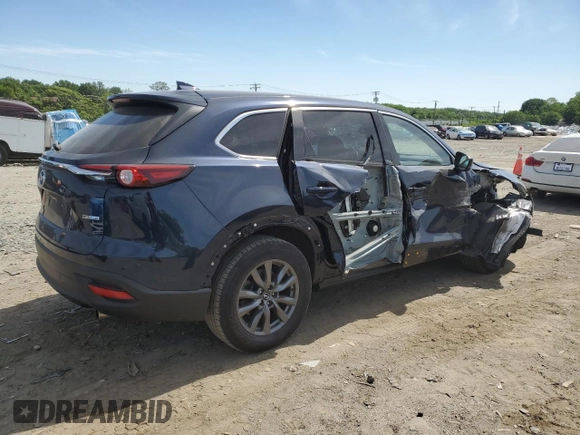2023 Mazda CX-9 Touring with VIN JM3TCBCY4P0652834, listed as a Copart auction lot 57668725 with 23,370 mi miles and Salvage title. Bid and sale history available at DreamBid. Image 3.