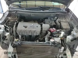 2018 Mitsubishi Outlander ES z VIN JA4AD2A33JZ061931, wystawiony jako Copart lot #72050365 z przebiegiem 128 272 mil mil oraz Szkoda całkowita • Salvage title. Historia ofert i sprzedaży dostępna na DreamBid. Obrazek 13.