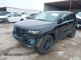 2018 Jeep Grand Cherokee Laredo E with VIN 1C4RJFAG5JC280033, listed as a IAAI auction lot 41953744 with 69,269 mi miles and . Bid and sale history available at DreamBid. Image 18.