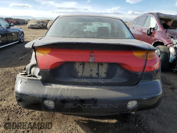 2002 Saturn SC z VIN 1G8ZY14702Z107166, wystawiony jako Copart lot #87435474 z przebiegiem 178 319 mil mil oraz Szkody całkowita. Historia ofert i sprzedaży dostępna na DreamBid. Obrazek 6.