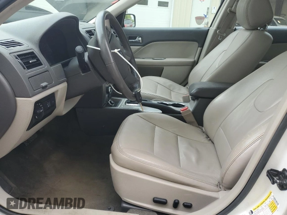 2012 Ford Fusion Hybrid with VIN 3FADP0L34CR414234, listed as a Copart auction lot 58891715 with 147,409 mi miles and Salvage title. Bid and sale history available at DreamBid. Image 7.