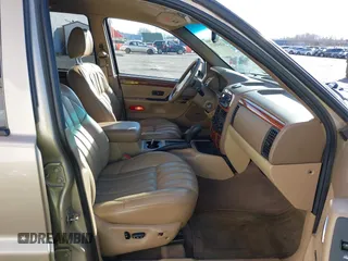 1999 Jeep Grand Cherokee Limited with VIN 1J4GW68N3XC688112, listed as a IAAI auction lot 41640033 with 196,851 mi miles. Bid and sale history available at carsss.com. Image 5.
