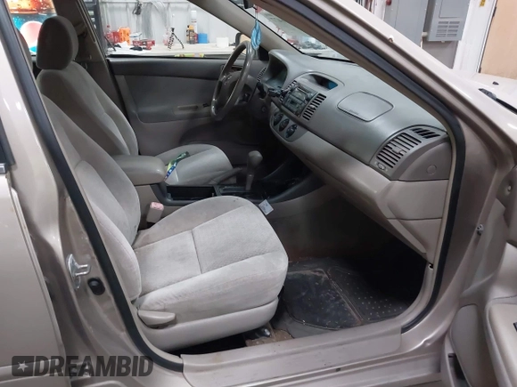 2004 Toyota Camry LE with VIN 4T1BE32K24U852256, listed as a IAAI auction lot 42036477 with 154,389 mi miles. Bid and sale history available at carsss.com. Image 5.