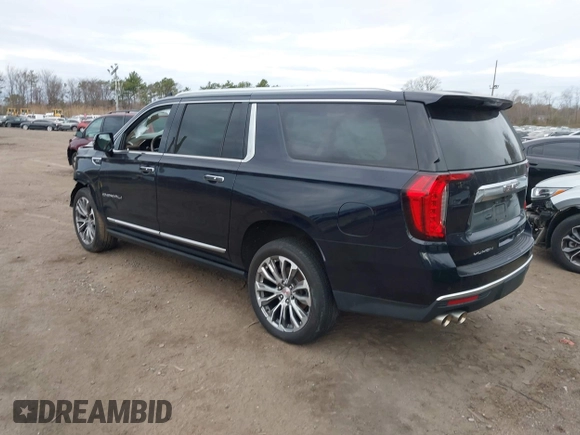 2021 GMC Yukon XL Denali with VIN 1GKS2JKL5MR290077, listed as a IAAI auction lot 41995590 with 82,939 mi miles. Bid and sale history available at carsss.com. Image 3.