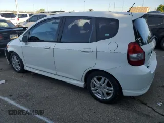 2007 Honda Fit Sport with VIN JHMGD386X7S048180, listed as a Copart auction lot 74252494 with 112,828 mi miles and Salvage Title. Bid and sale history available at carsss.com. Image 2.