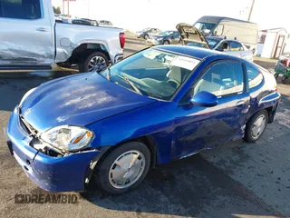 2002 Honda Insight z VIN JHMZE14722T000006, wystawiony jako IAAI lot #41049894 z przebiegiem 185 989 mil mil oraz . Historia ofert i sprzedaży dostępna na DreamBid. Obrazek 6.