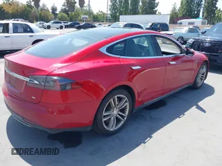 2014 Tesla Model S 60 with VIN 5YJSA1S11EFP33278, listed as a IAAI auction lot 42441781 with Not provided miles and . Bid and sale history available at DreamBid. Image 4.