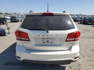 2013 Dodge Journey Crew with VIN 3C4PDCDG5DT668803, listed as a Copart auction lot 61931035 with 121,173 mi miles and Salvage title. Bid and sale history available at DreamBid. Image 6.