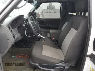 2011 Ford Ranger XLT with VIN 1FTLR4EEXBPA89648, listed as a Copart auction lot 54789615 with 106,630 mi miles and Salvage title. Bid and sale history available at DreamBid. Image 7.