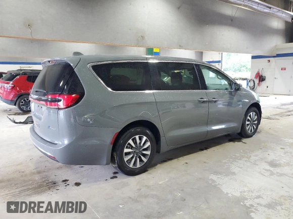 2021 Chrysler Pacifica Hybrid Touring L with VIN 2C4RC1L72MR596429, listed as a Copart auction lot 53859345 with 97,218 mi miles and Salvage title. Bid and sale history available at DreamBid. Image 3.