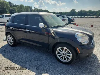 2015 MINI Countryman S with VIN WMWZC3C58FWT06647, listed as a Copart auction lot 63597265 with Not provided miles and Clean title. Bid and sale history available at DreamBid. Image 4.