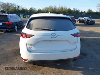 2017 Mazda CX-5 Touring with VIN JM3KFBCL8H0136601, listed as a IAAI auction lot 41830355 with 113,677 mi miles. Bid and sale history available at carsss.com. Image 17.