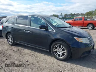 2011 Honda Odyssey EX with VIN 5FNRL5H4XBB011918, listed as a IAAI auction lot 42056043 with 201,821 mi miles and . Bid and sale history available at carsss.com. Image 1.