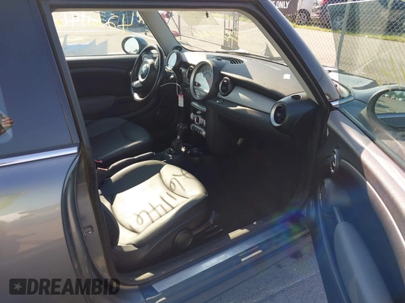 2010 MINI Hardtop with VIN WMWMF3C51ATZ61146, listed as a IAAI auction lot 42611461 with 96,038 mi miles and . Bid and sale history available at DreamBid. Image 5.