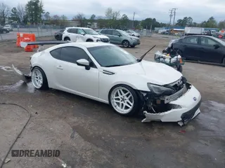 2014 Subaru BRZ Limited with VIN JF1ZCAC1XE9605919, listed as a IAAI auction lot 41936048 with 74,468 mi miles. Bid and sale history available at carsss.com. Image 1.