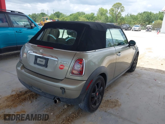 2010 MINI Convertible with VIN WMWMR3C52ATU97825, listed as a IAAI auction lot 42349417 with 64,045 mi miles and . Bid and sale history available at DreamBid. Image 4.