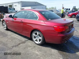 2011 BMW 3 Series 335i with VIN WBADX7C50BE742916, listed as a IAAI auction lot 41918648 with 82,801 mi miles and . Bid and sale history available at carsss.com. Image 3.
